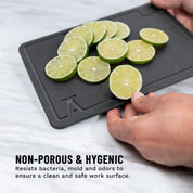 Photo of cut limes on a white marble counter using the elevated craft cutting board