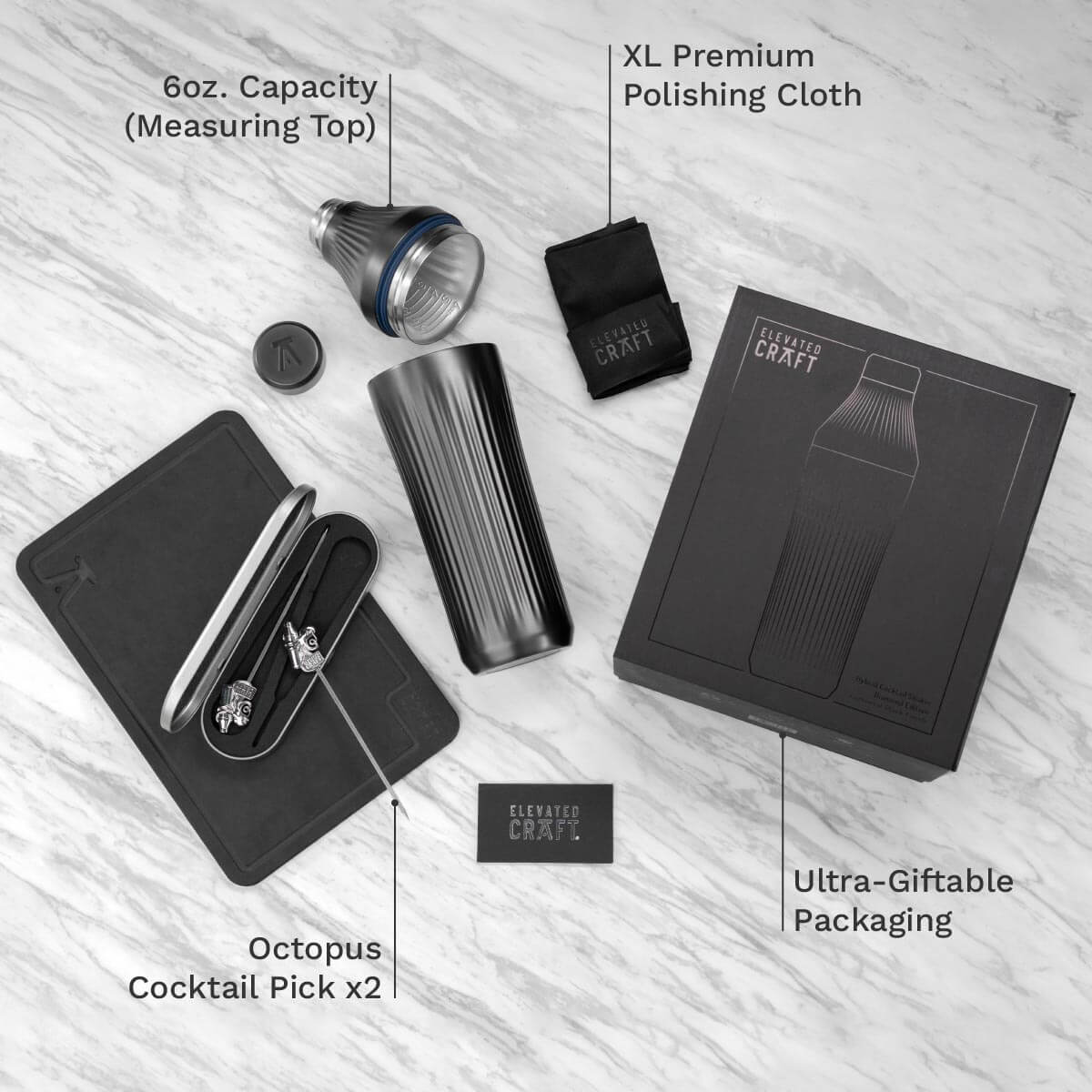 Collection of cocktail-making tools with labeled features on a light wooden surface