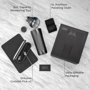 Collection of cocktail-making tools with labeled features on a light wooden surface