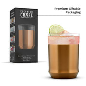 The brushed copper finish Elevated Craft Hybrid Cocktail Glass in the foreground and the premium giftable packaging in the background