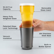 Hand holding glass insert of Elevated Craft Gunmetal Black Hybrid Pint Glass above the steel base with feature callouts