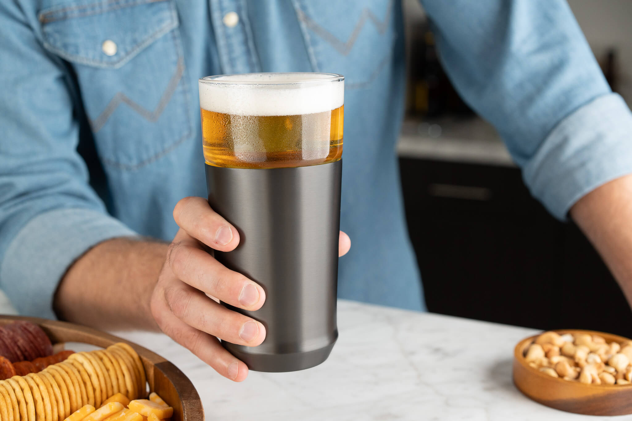 Man holding a hybrid pint glass