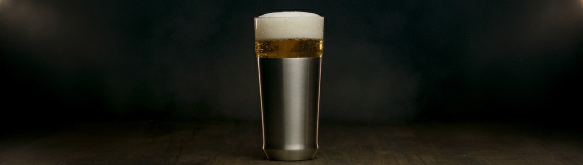 Glass of beer with a dark background
