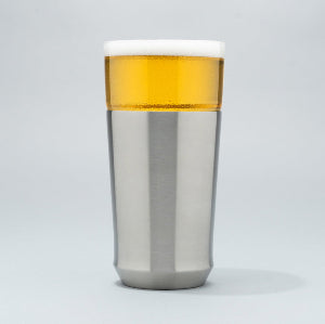 steel Hybrid Pint glass with beer inside on grey background