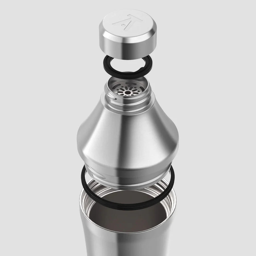 Exploded view of Stainless Steel Elevated Craft Hybrid Cocktail Shaker showcasing lid, gaskets, measuring top, and tumbler