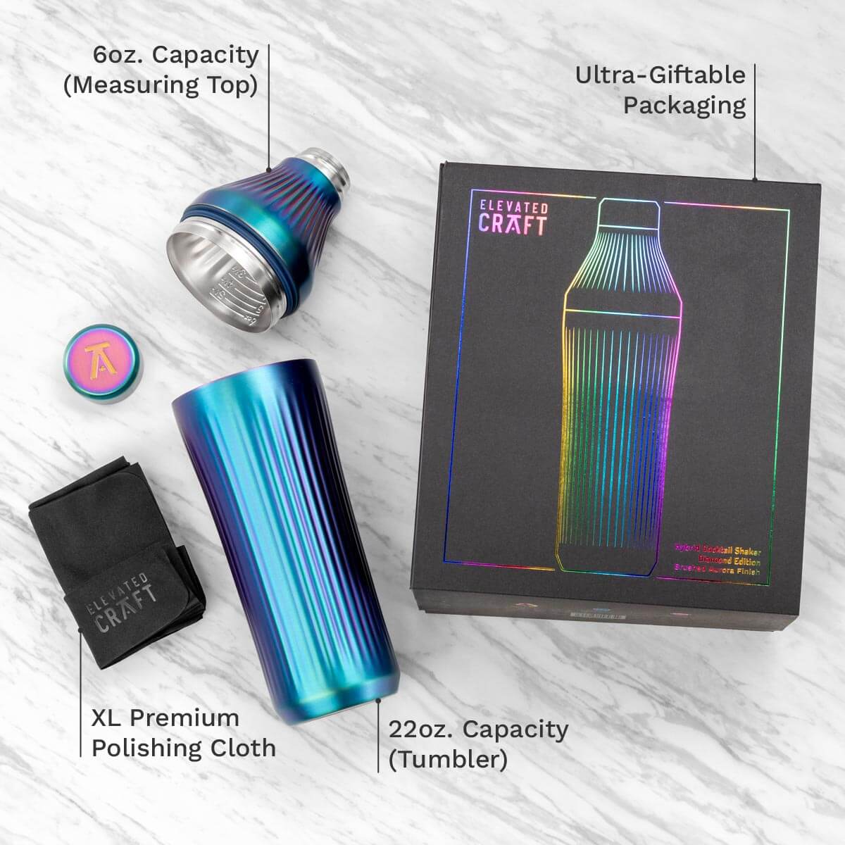 Elevated Craft drinkware set with tumbler, measuring top, polishing cloth, and packaging on a light background.