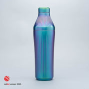Gradient blue and purple water bottle on a light gray background with Red Dot Award logo.