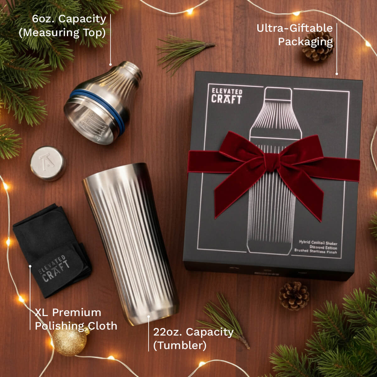 Elevated Craft product set with tumbler, measuring top, and packaging on a wooden surface with Christmas decorations.