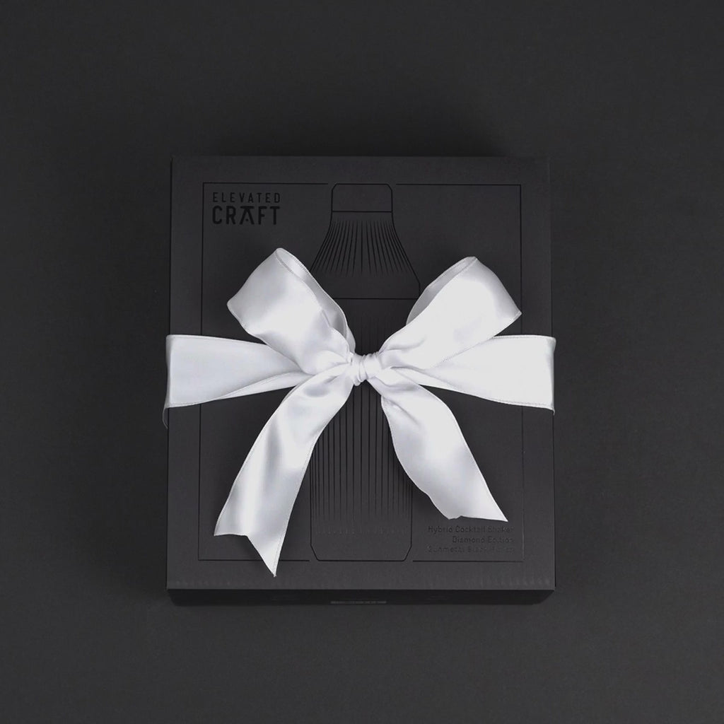 Gif-style video of unboxing Gunmetal Black Elevated Craft Diamond Edition Hybrid Cocktail Shaker with white ribbon bow