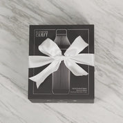 Gif-style video of unboxing Stainless Steel Elevated Craft Diamond Edition Hybrid Cocktail Shaker with white ribbon bow