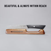 Video of knife being picked up from stand and twisted with text "Beautiful & Always Within Reach" on grey background