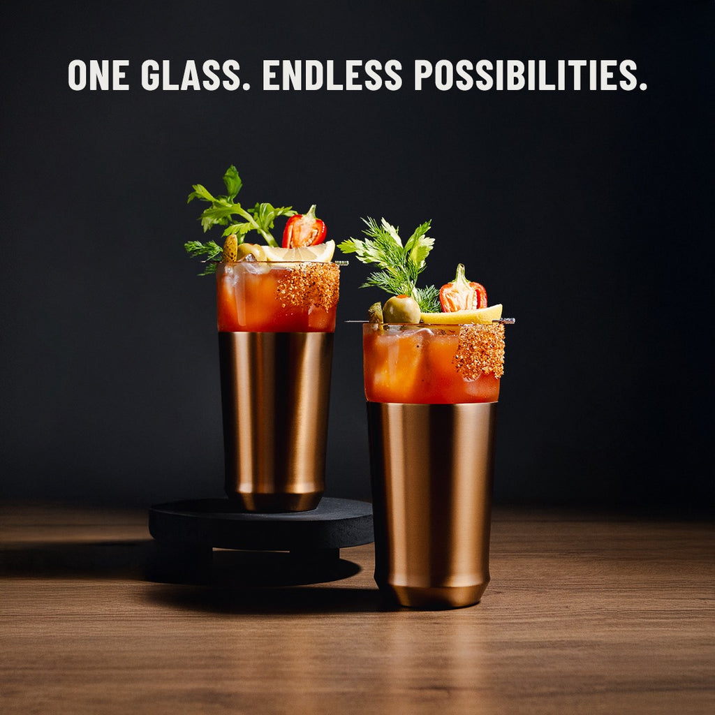 Two copper pint glasses holding cocktails and beer