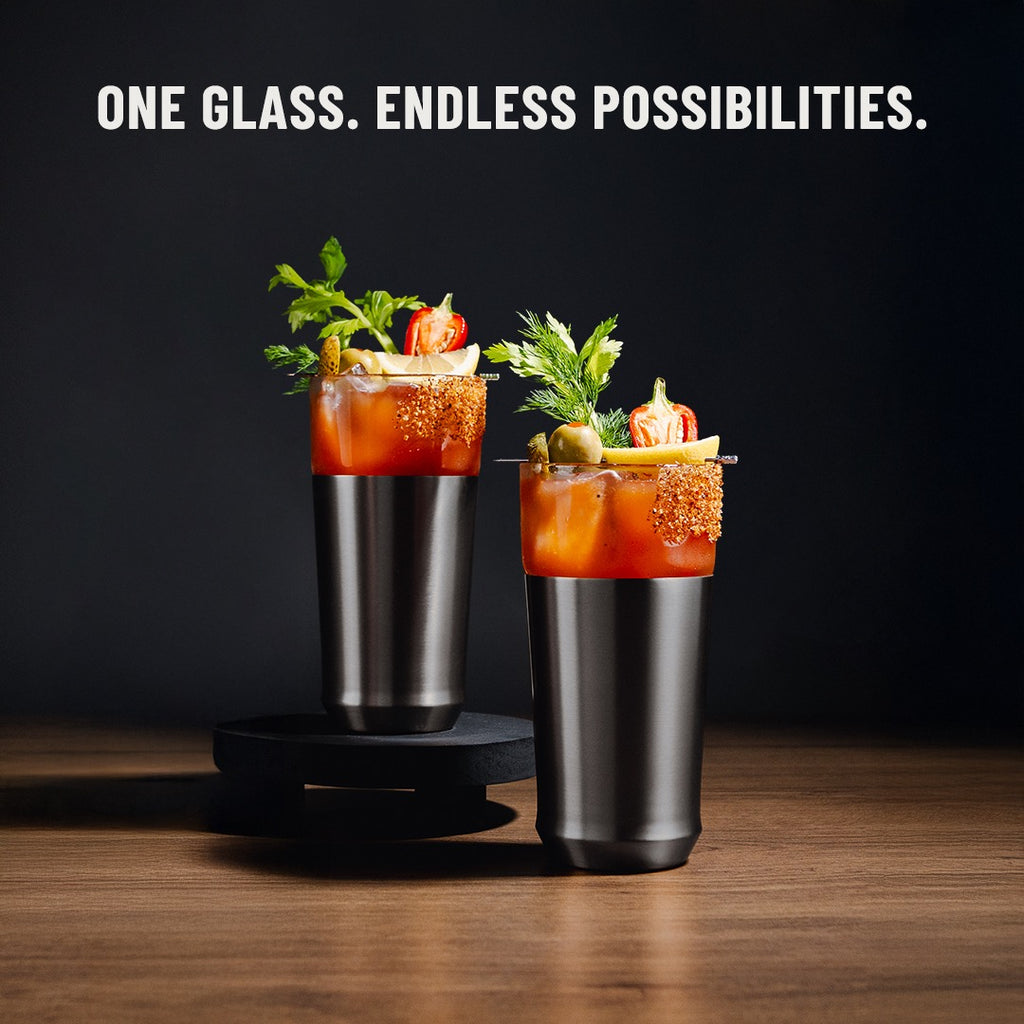 Two black pint glasses holding cocktails and beer